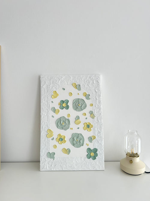 Decorative wall textured art with floral pattern on a white background